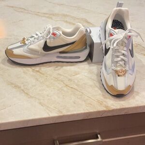Nike White and Gold Sneakers